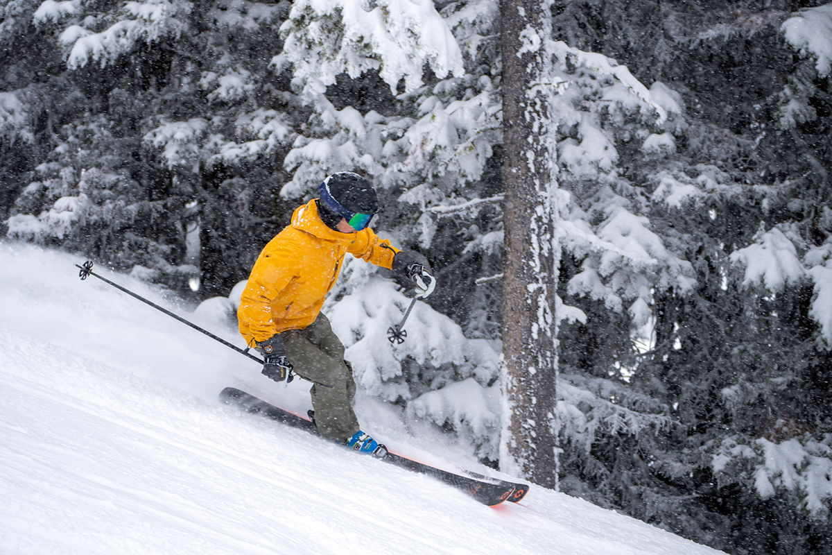 Trew Gear Cosmic Primo Jacket (skiing next to trees)